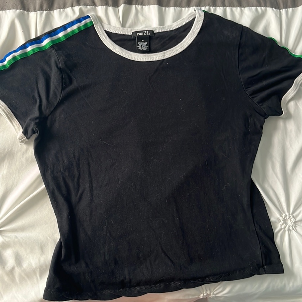 Cute cropped black tee with fun sleeve accent!